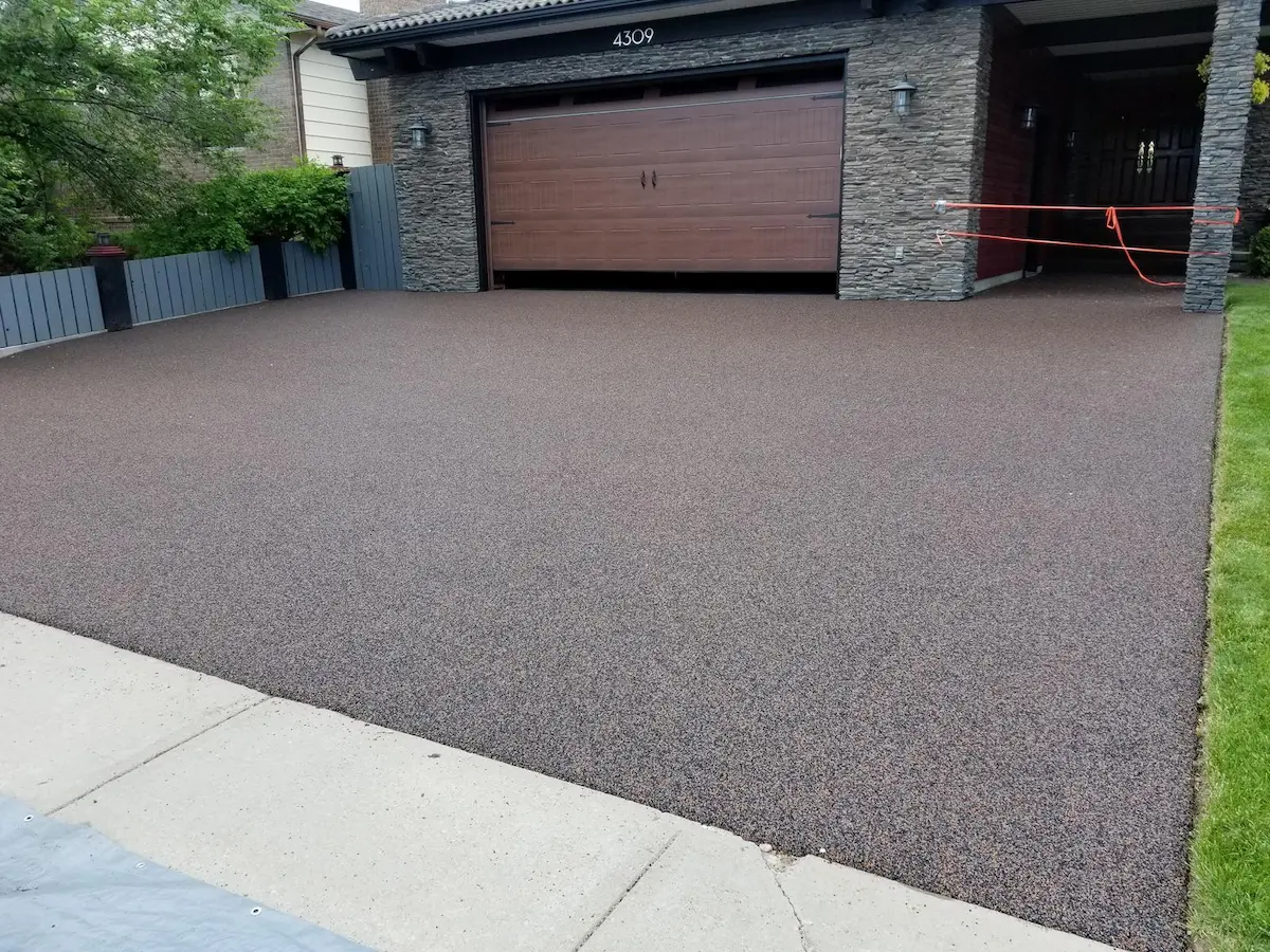 Repaired and refreshed Rubber Stone driveway in Calgary