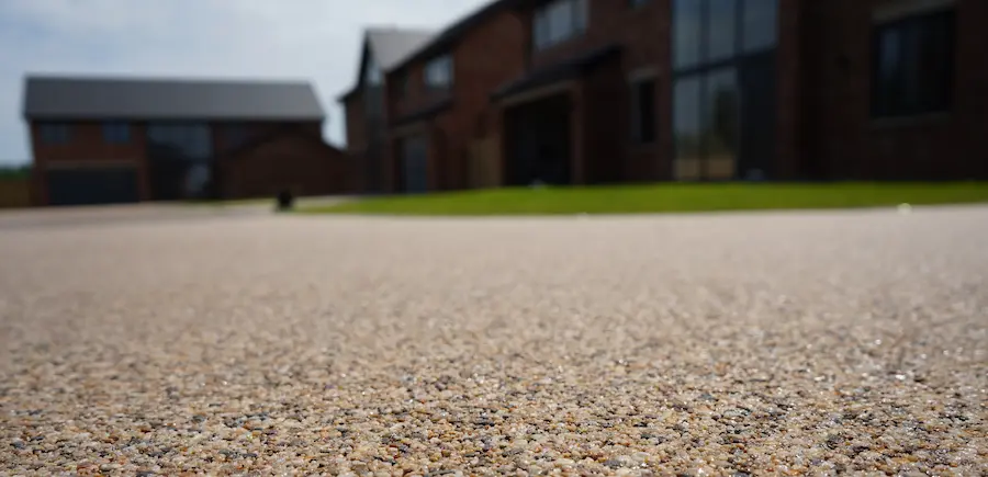 Resealing and refreshing a resin-bound stone surface